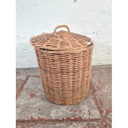 47 - A wicker cylindrical lidded basket - approx. 59cm high x 47cm diameter