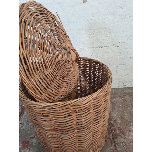 47 - A wicker cylindrical lidded basket - approx. 59cm high x 47cm diameter