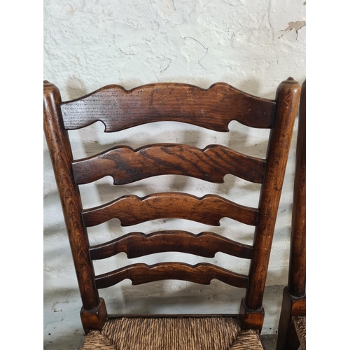 54 - Four 19th century style beech and elm rush seated Lancashire dining chairs