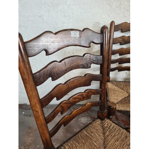 54 - Four 19th century style beech and elm rush seated Lancashire dining chairs