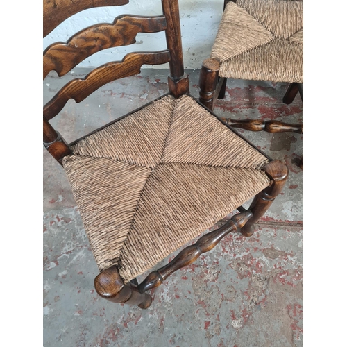 54 - Four 19th century style beech and elm rush seated Lancashire dining chairs