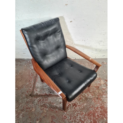 6 - A mid 20th century Cintique teak and black vinyl armchair - approx. 89cm high x 71cm wide x 64cm dee... 