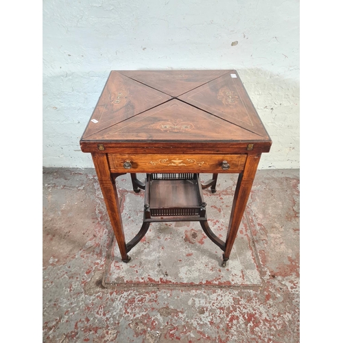 7 - A late Victorian inlaid rosewood envelope games table - approx. 75cm high x 55cm square