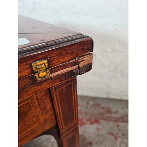 7 - A late Victorian inlaid rosewood envelope games table - approx. 75cm high x 55cm square