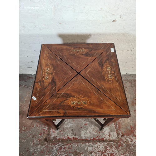 7 - A late Victorian inlaid rosewood envelope games table - approx. 75cm high x 55cm square