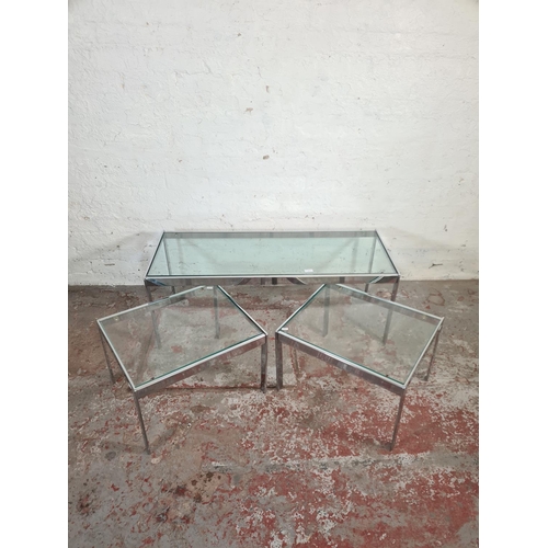 9 - A 1970s Merrow Associates chrome and glass nest of three tables - largest approx. 42cm high x 114cm ... 