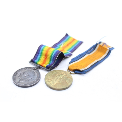 1159C - A WWI medal pair with original ribbons presented to 31074 PTE H.G Walters - Yorkshire Regiment