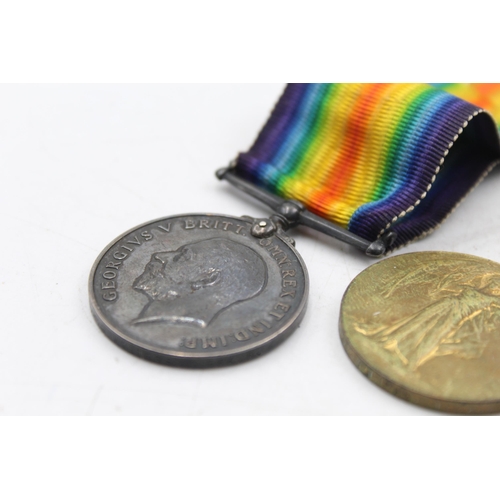 1159C - A WWI medal pair with original ribbons presented to 31074 PTE H.G Walters - Yorkshire Regiment