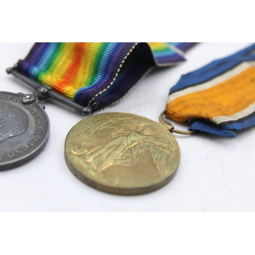 1159C - A WWI medal pair with original ribbons presented to 31074 PTE H.G Walters - Yorkshire Regiment