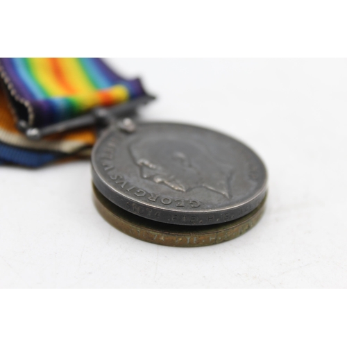 1159C - A WWI medal pair with original ribbons presented to 31074 PTE H.G Walters - Yorkshire Regiment