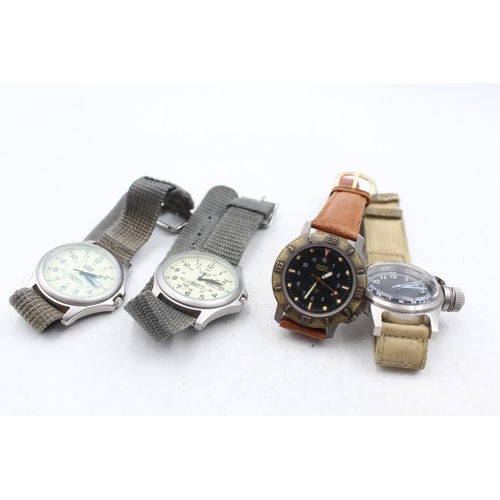 1228 - Four quartz men's wristwatches to include Lorus, Sekonda etc.