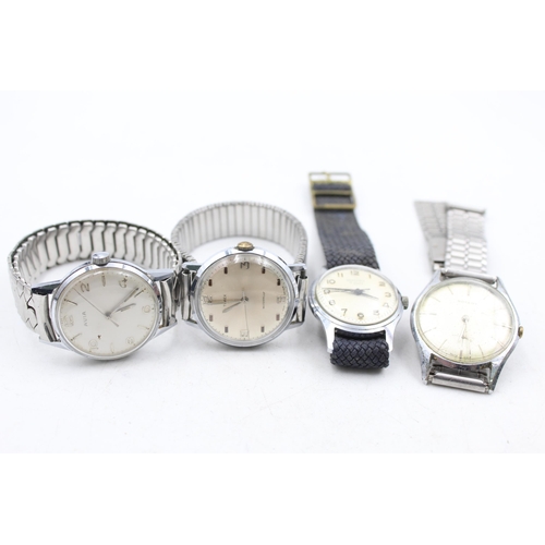 1232 - Four vintage mechanical men's wristwatches to include Rotary, Avia etc.