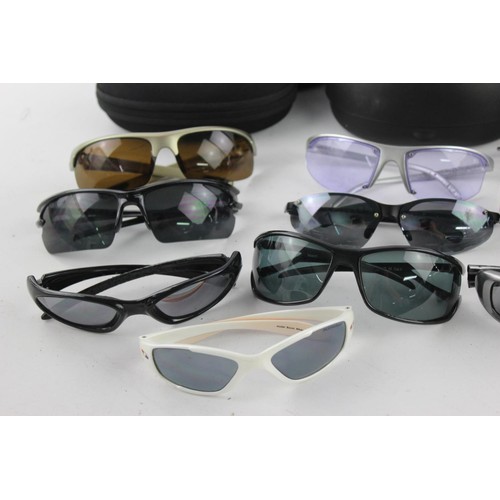 426 - A collection of sunglasses to include Animal, Slokker etc.