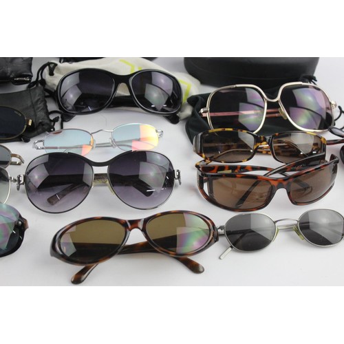 427 - A collection of sunglasses to include Armani, Calvin Klein, Guess etc.