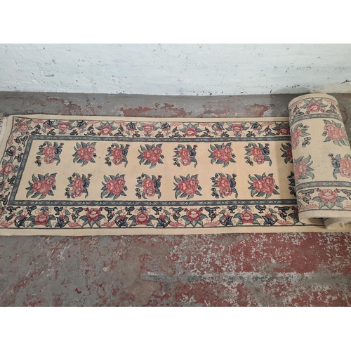 100 - A floral patterned hall runner - approx. 500cm long x 79cm wide