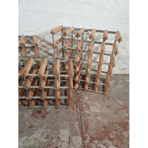 106 - Three wood and metal bottle racks - largest approx. 52cm high x 52cm wide x 23cm deep