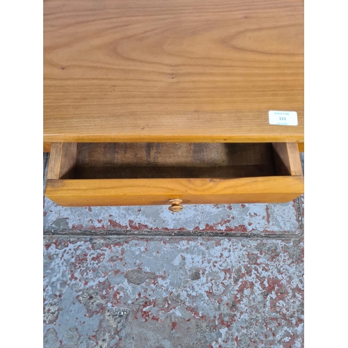 111 - An Indian style cherry wood rectangular coffee table with single drawer - approx. 40cm high x 58cm w... 