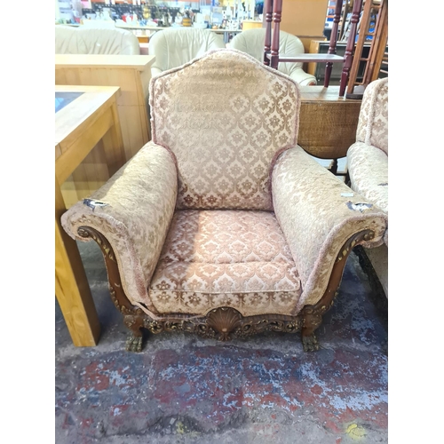 113 - A Georgian style mahogany and floral upholstered three piece lounge suite comprising two seater sofa... 