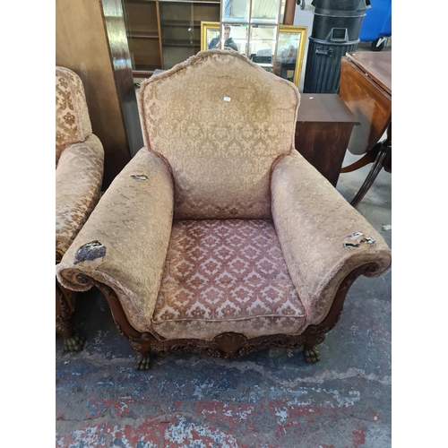 113 - A Georgian style mahogany and floral upholstered three piece lounge suite comprising two seater sofa... 