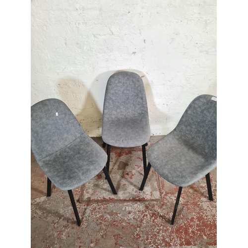 123 - Three modern grey fabric upholstered and black metal dining chairs