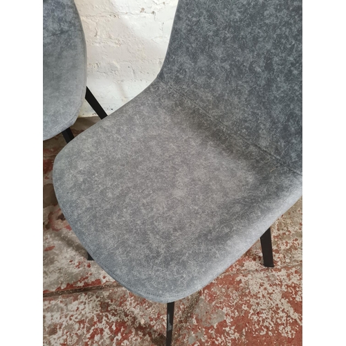 123 - Three modern grey fabric upholstered and black metal dining chairs