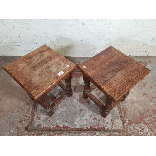 134 - A pair of 17th century style solid oak joint side tables - approx. 40cm high x 33cm square