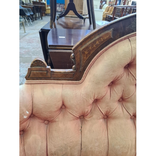 67 - A Victorian inlaid walnut and pink fabric upholstered parlour sofa - approx. 100cm high x 170cm wide... 