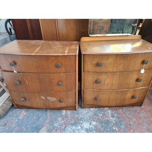 69 - An Art Deco style oak three piece bedroom suite comprising single wardrobe, chest of three drawers a... 