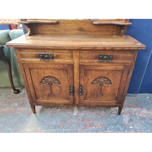 72 - An Art Nouveau oak mirror back sideboard - approx. 196cm high x 122cm wide x 45cm deep