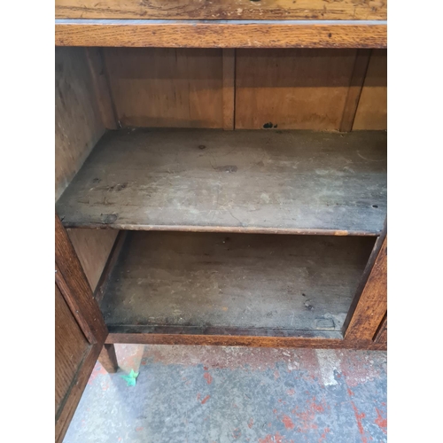 72 - An Art Nouveau oak mirror back sideboard - approx. 196cm high x 122cm wide x 45cm deep