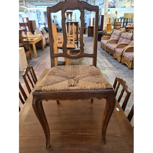 83 - A French style beech rectangular extending dining table with six matching chairs - approx. 76cm high... 