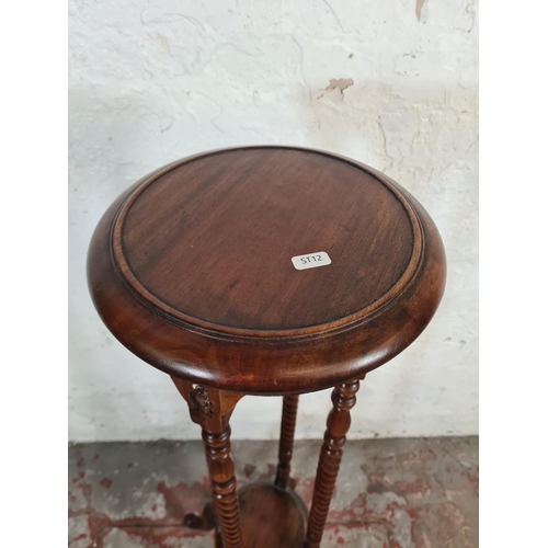 86 - A 19th century style mahogany bobbin turned two tier jardinière stand - approx. 102cm high x 27cm di... 