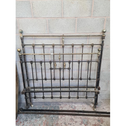 1A - A Victorian cast iron and brass double bed frame