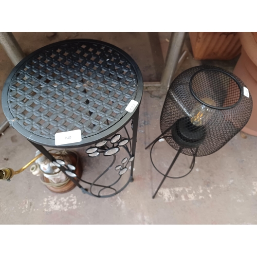 740 - Three items to include, ceramic figural lamp, battery powered outdoor light etc.