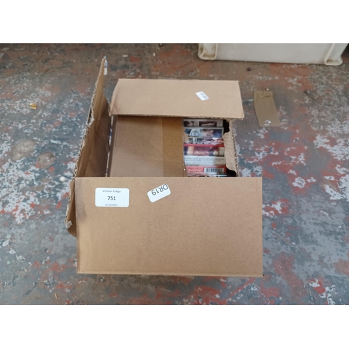 751 - A box containing ten adult DVDs