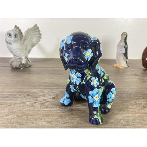 249 - Four ceramic animal figurines to include Tina Wagstaff Floral Parade puppy, The Leonardo Collection ... 