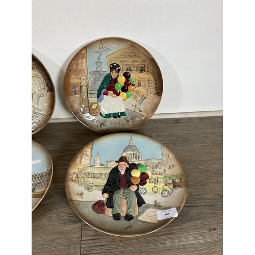 283 - Seven Royal Doulton collector's plates, three The Balloon Man D6655, two The Old Balloon Seller D664... 