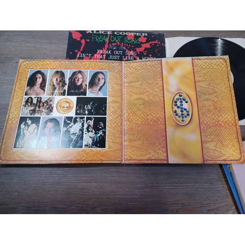 644 - Seven Alice Cooper vinyl records, one 'Pretties for You' (STS 1051 with promo sticker to front cover... 