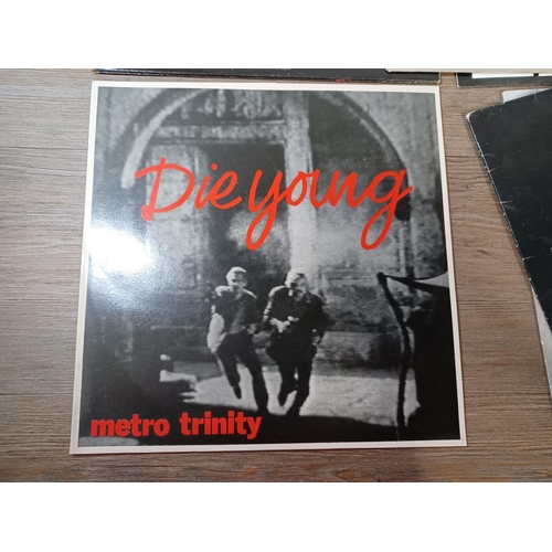 652 - A collection of vinyl records to include Metro Trinity 'Die Young' (1987 - Caféteria - CTA0001 - 12