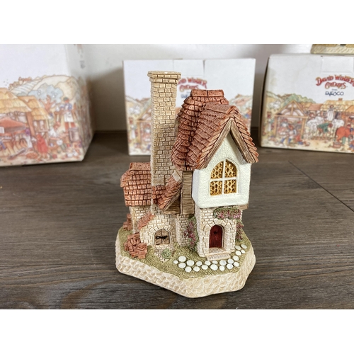 293 - Four boxed Enesco David Winter cottages, Firkin Cottage, Cedar Span, Tilemaker's Cottage and Avebury... 