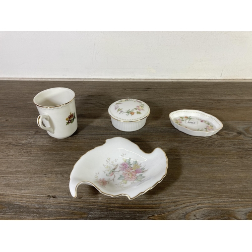 299 - A collection of ceramics and glassware to include four pieces of Wedgwood pale blue Jasperware, boxe... 