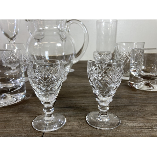 300 - A collection of glassware to include Dartington 16cm jug, six Thomas Webb sherry glasses, Edinburgh ... 