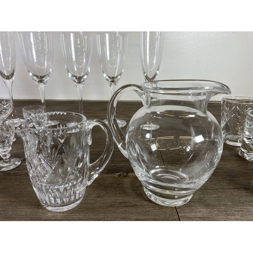 300 - A collection of glassware to include Dartington 16cm jug, six Thomas Webb sherry glasses, Edinburgh ... 