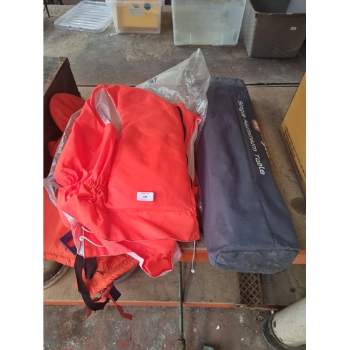 528 - Three items, two bagged Heli-Hansen Navigare-CL buoyancy aids and one cased Higear single aluminium ... 