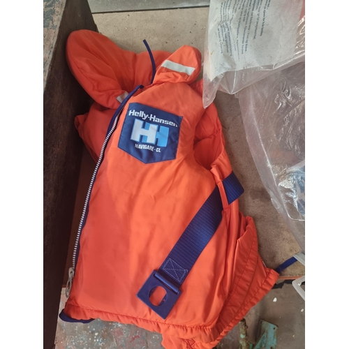 528 - Three items, two bagged Heli-Hansen Navigare-CL buoyancy aids and one cased Higear single aluminium ... 