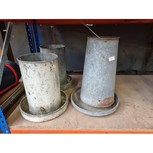 531 - Three galvanised chicken feeders - approx. 49cm high