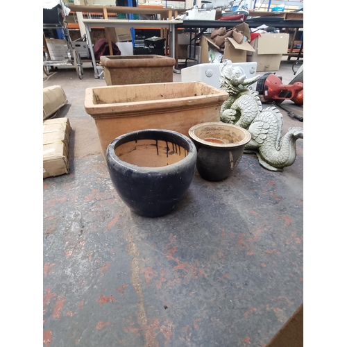 549 - Five terracotta and glazed planters - largest approx. 41cm high