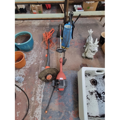 552 - Three garden items, one Flymo Multi Trim 240V strimmer, one Champion petrol strimmer and one Supa ga... 