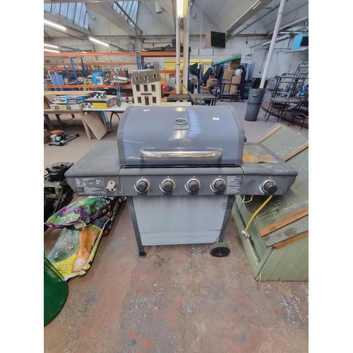 567 - A UniFlame gas barbeque - approx. 122cm high x 139cm wide x 49cm deep