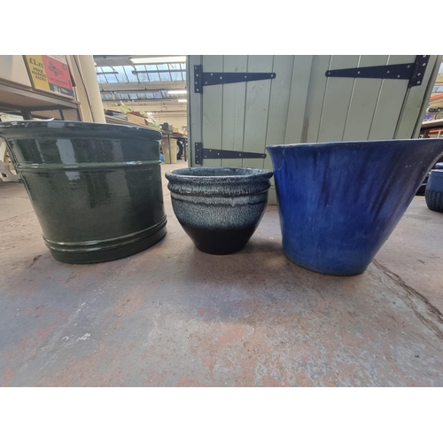 568A - Three glazed terracotta planters - largest approx. 35cm high